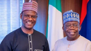 Minister of State for Finance-designate, Taiwo Oyedele (L), President Bola Ahmed Tinubu (R)