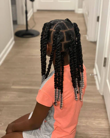 Parted Ponytail With Twists